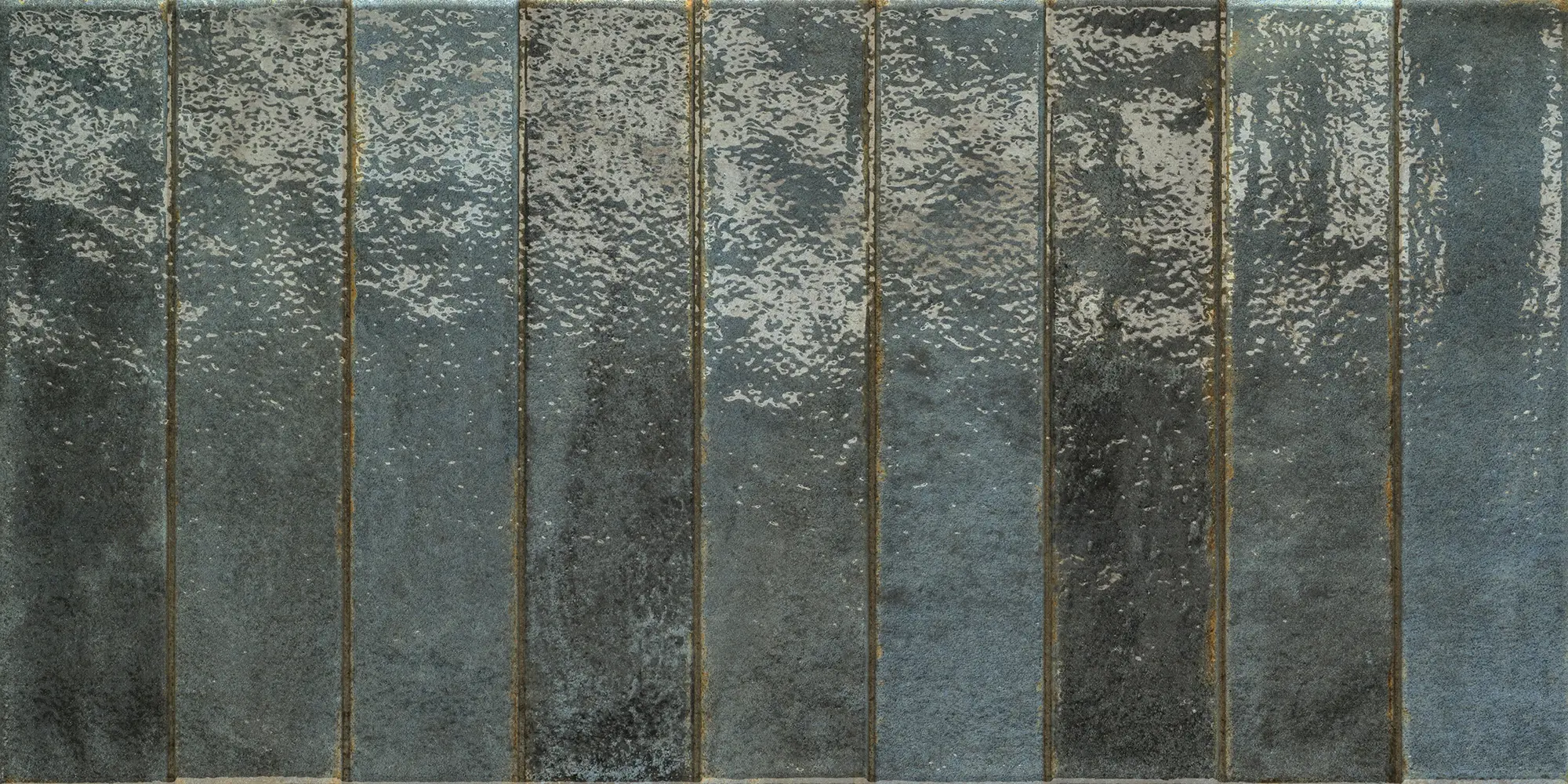Glossy dark blue rectangular ceramic tiles arranged vertically in a row.