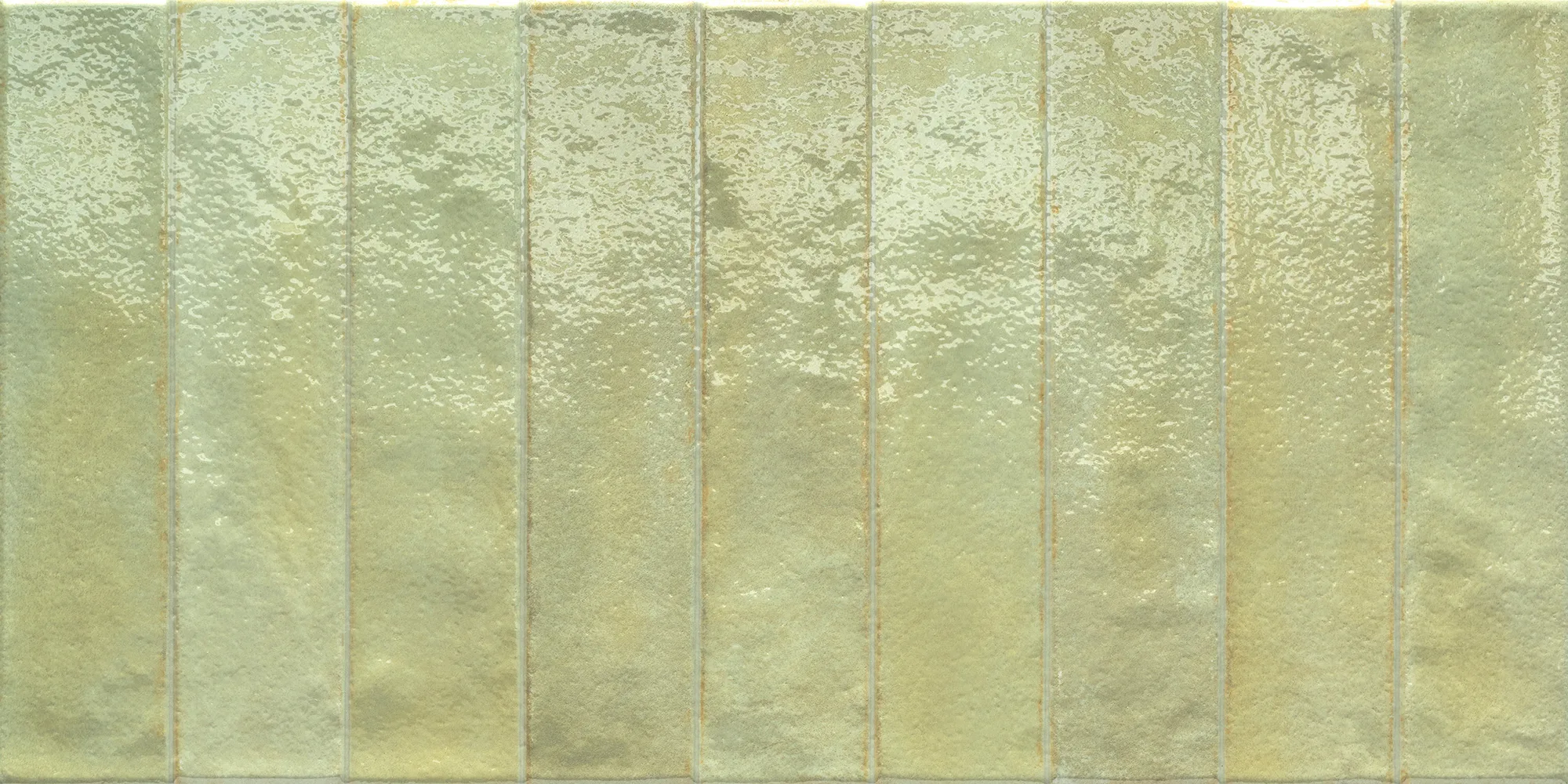 Glossy rectangular ceramic tiles in a muted mint green with subtle texture and color variations.