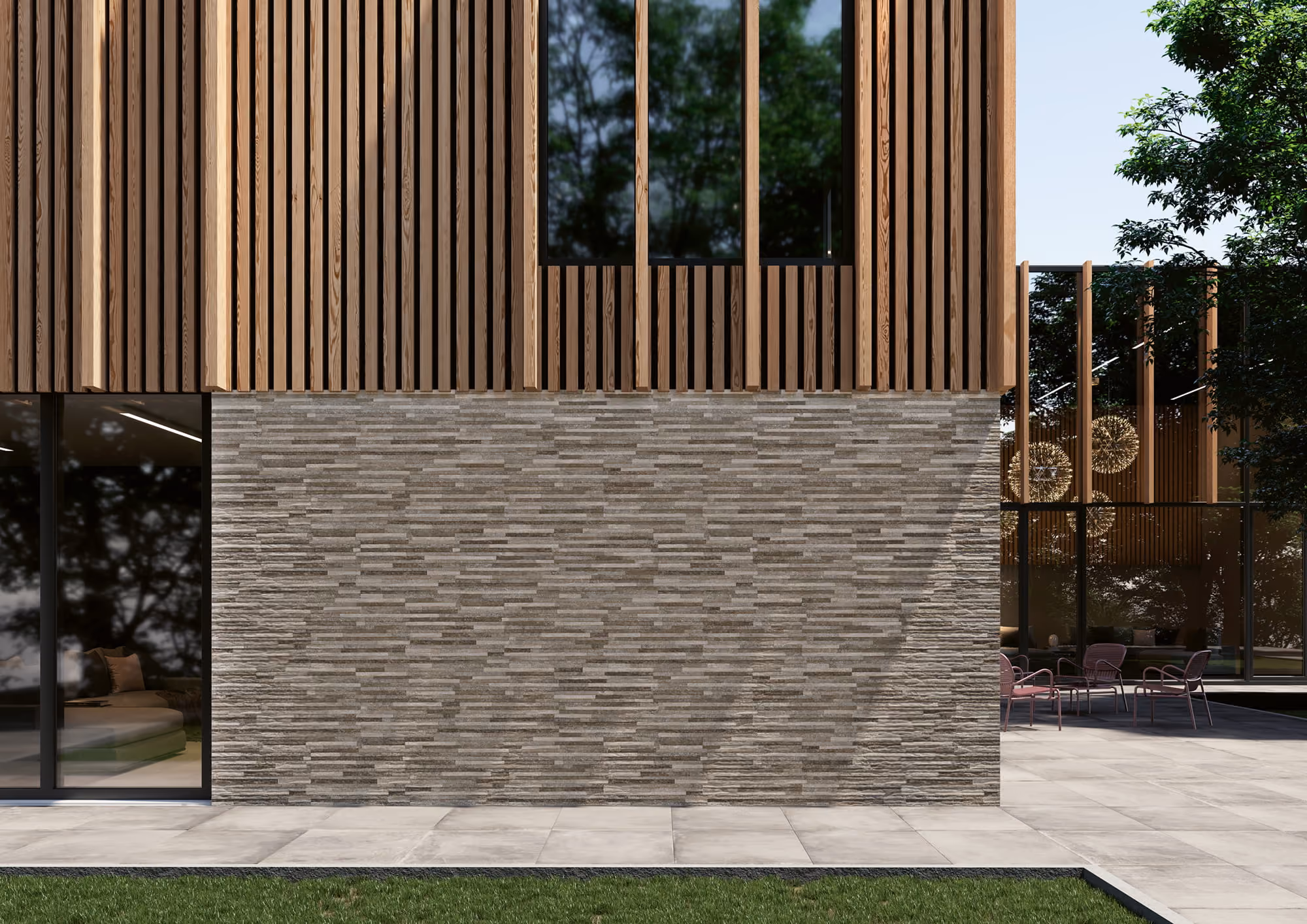 Modern building facade with wooden vertical slats above grey stone wall and glass door to left.