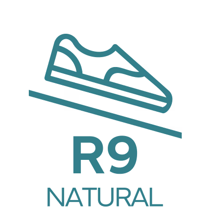 Icon of a shoe on an inclined surface with text 'R9 NATURAL' below it.
