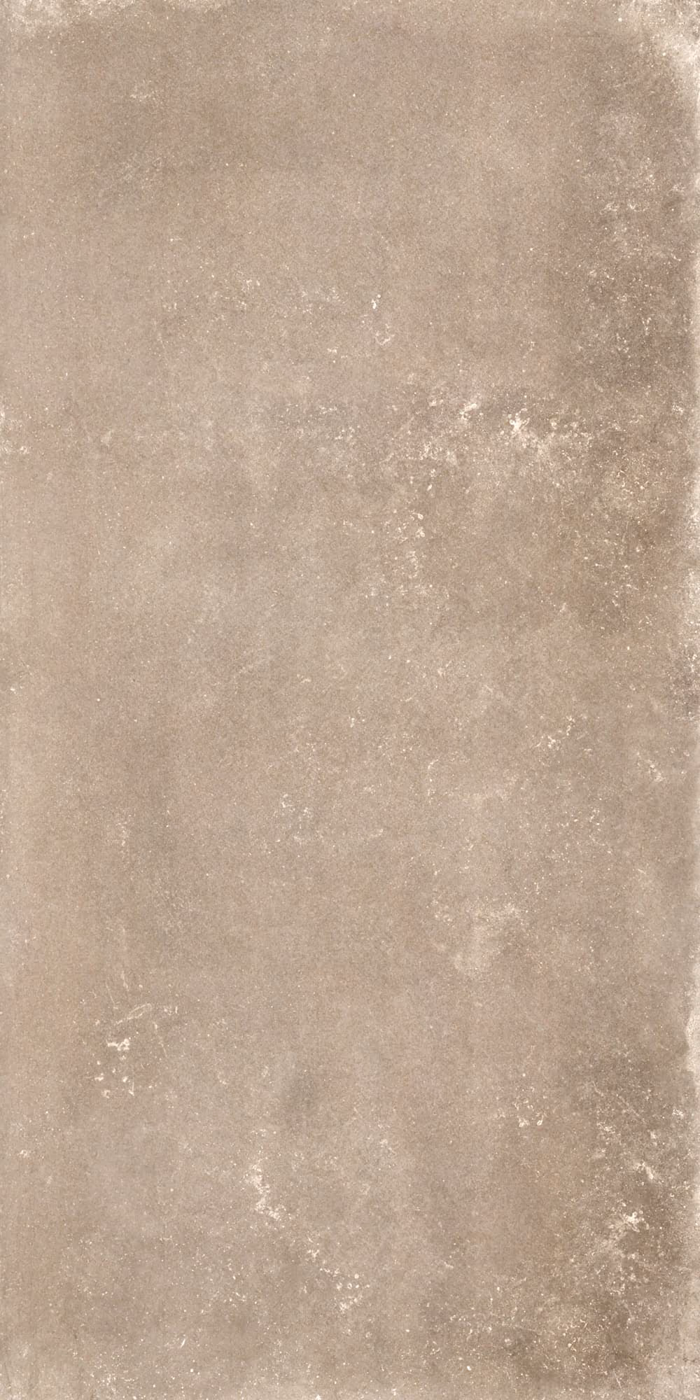 Close-up of a smooth beige stone tile with subtle texture and natural variations.
