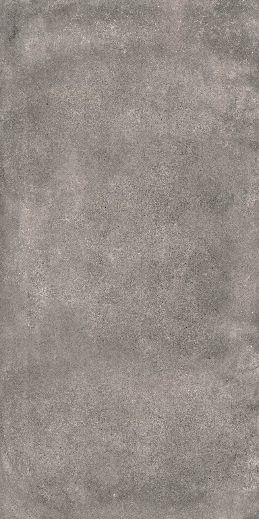 Gray textured concrete surface with subtle variations in tone and fine grain.