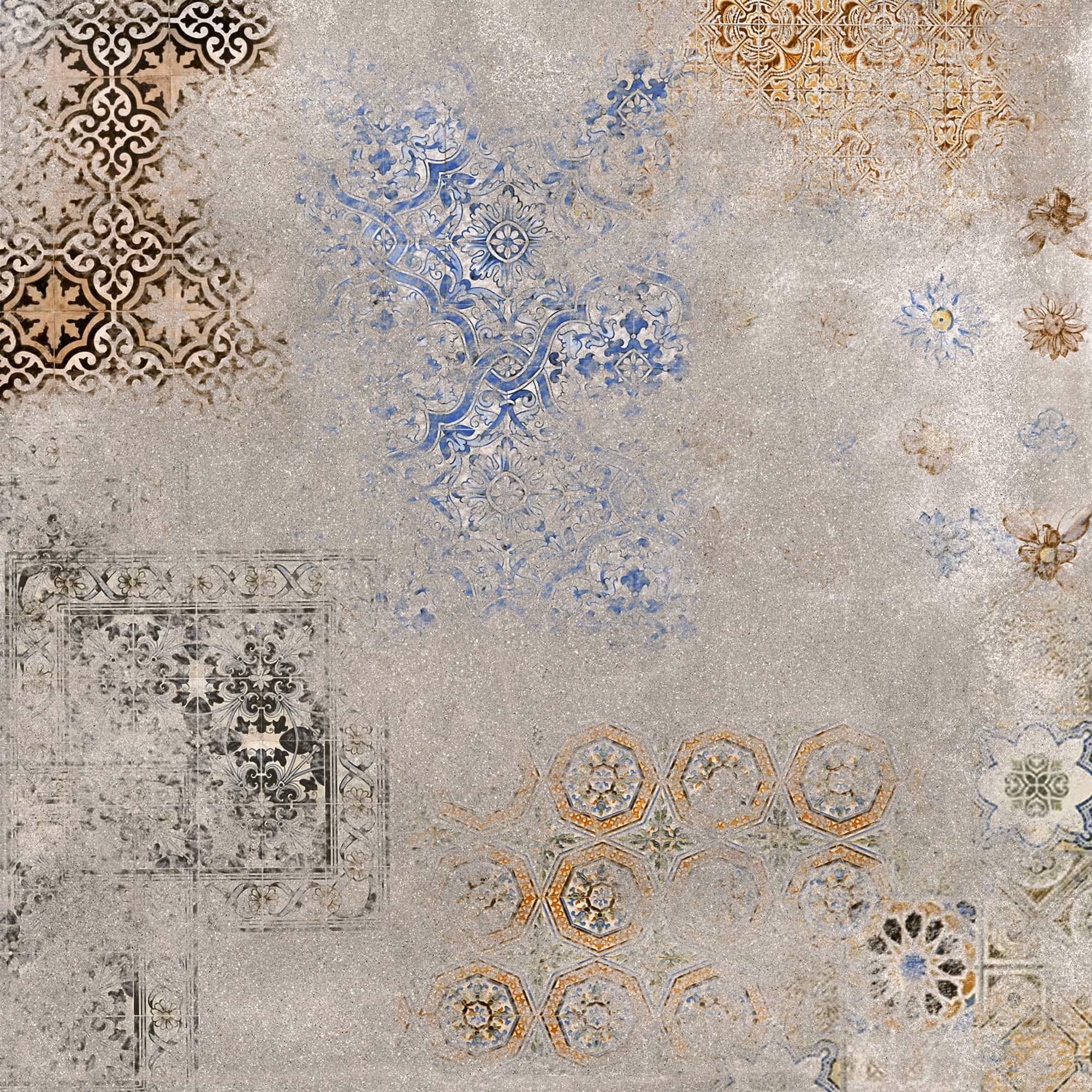 Worn vintage tile pattern with faded blue, brown, and black intricate floral and geometric designs on gray background.