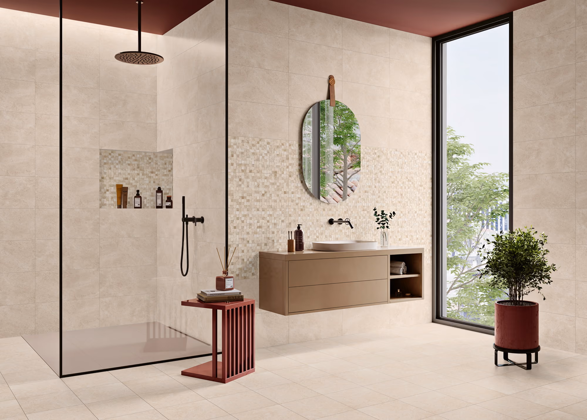 Modern bathroom with glass shower, wall-mounted sink, oval mirror, and large window with plants.