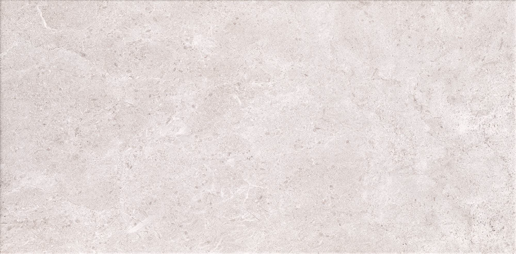 Light grey textured stone tile with subtle marbling and natural patterns.
