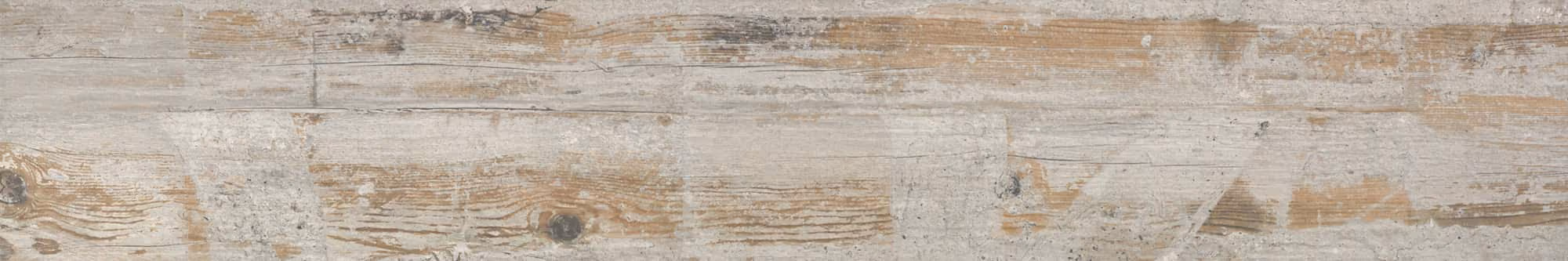 Close-up of a weathered wooden surface with faded paint and visible wood grain patterns.
