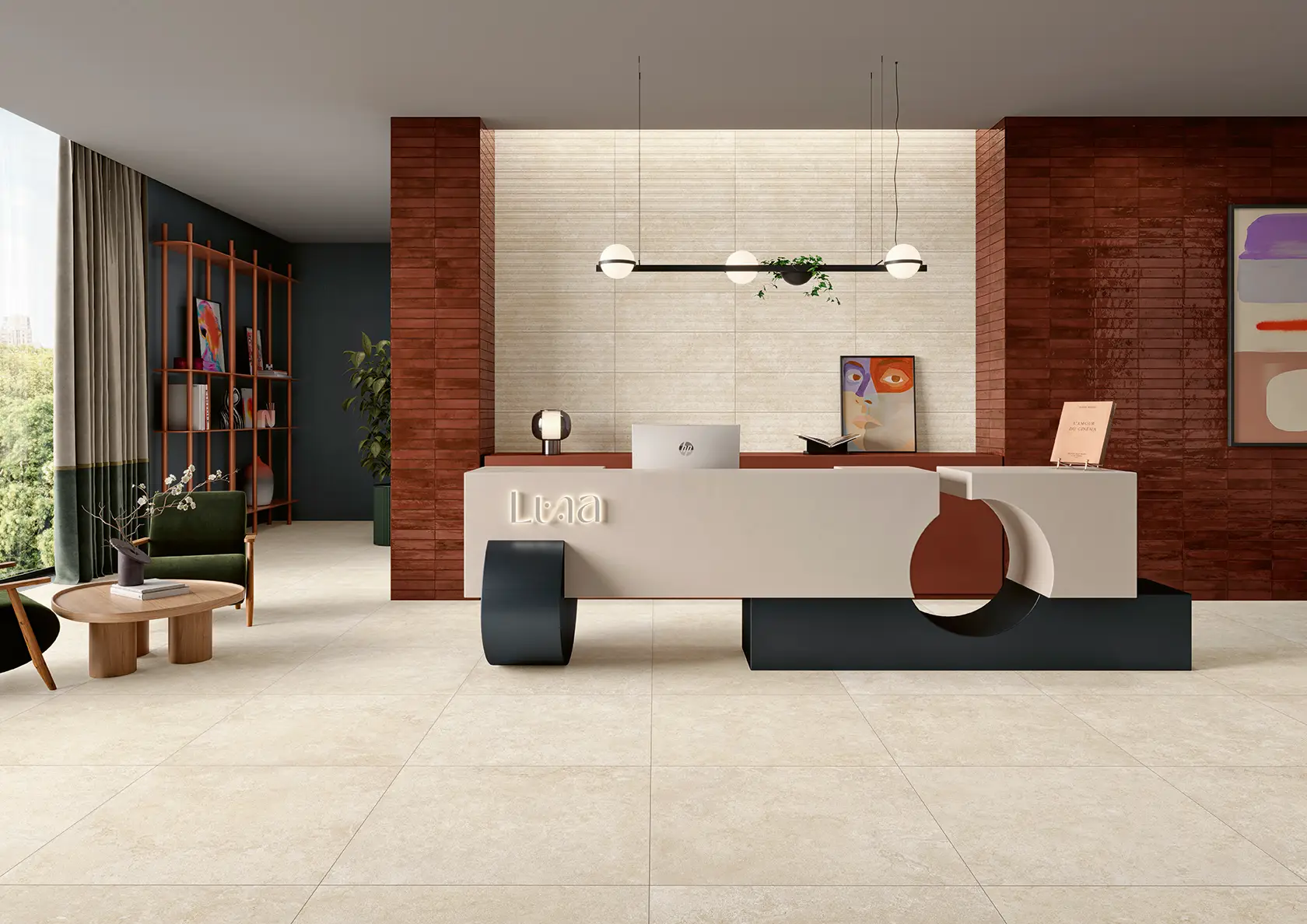 Modern reception area with artistic desk, pendant lights, green chairs, and decorative wall art.