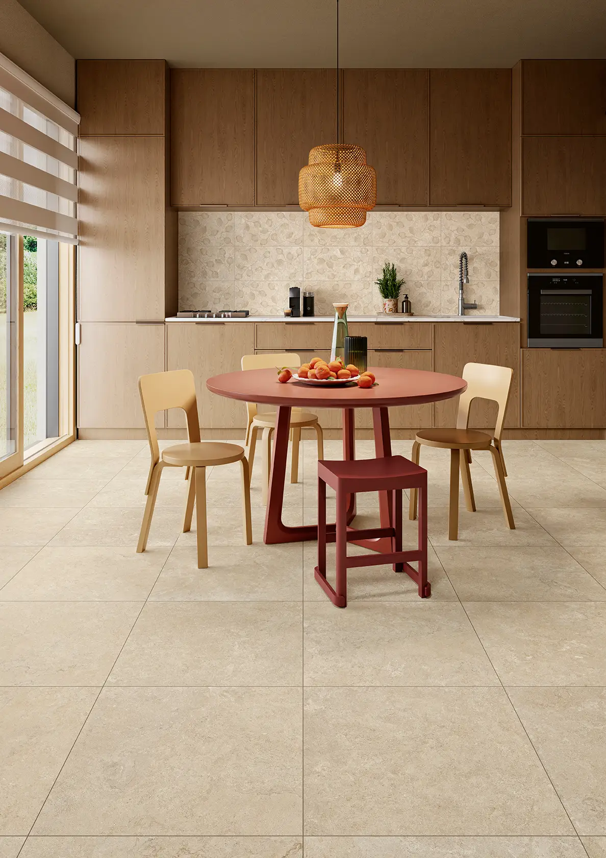 Modern kitchen with beige tile floor, wooden cabinets, round red table, and four chairs.