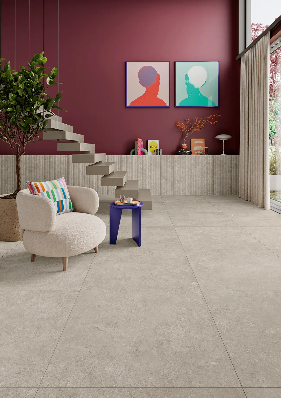 Modern living room with beige stone tile floor, curved chair, purple side table, and floating stairs.
