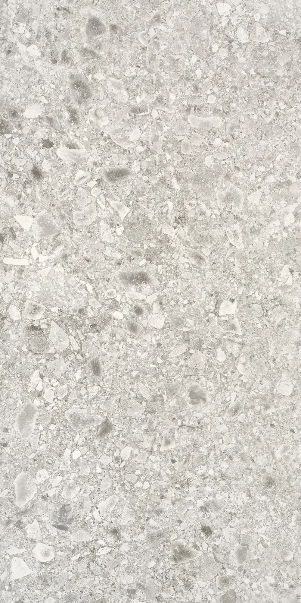 Light gray terrazzo surface with scattered white and darker stone chips texture.