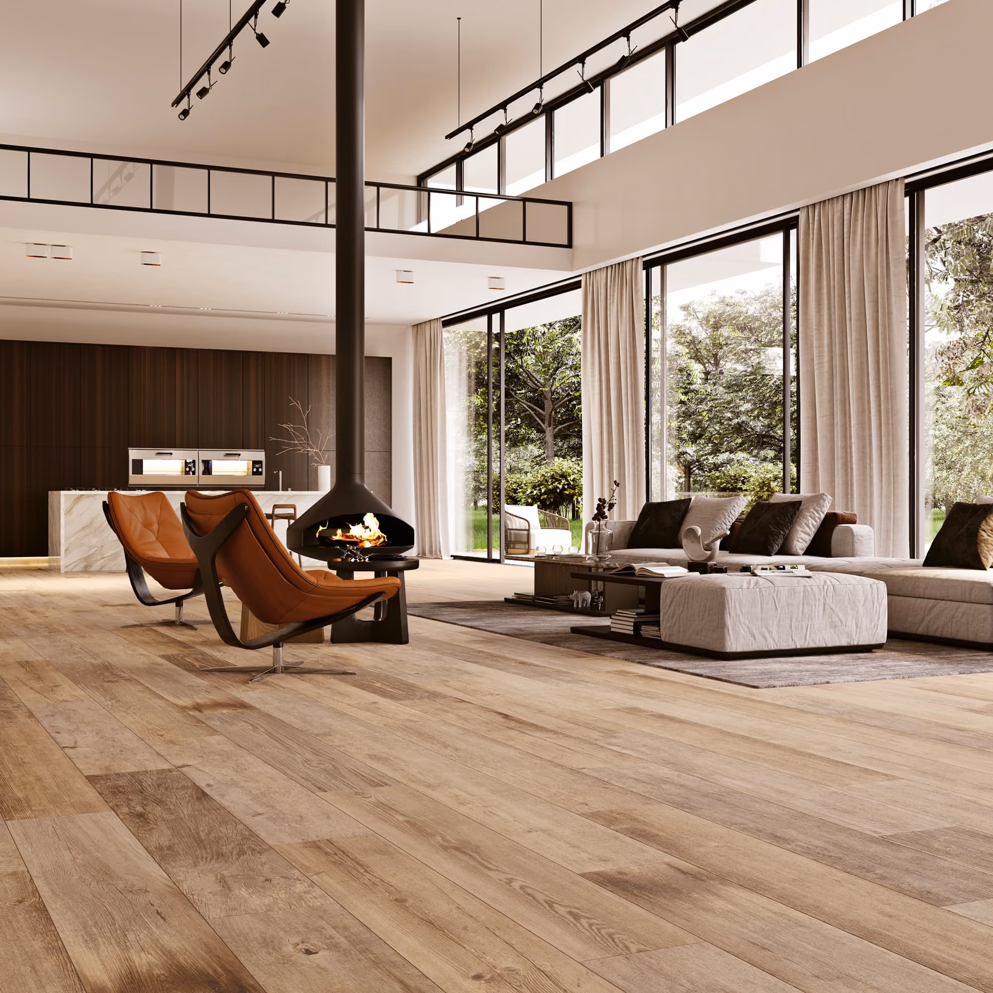 Modern living room with large windows, brown chairs, a fireplace, and beige sofas overlooking greenery.