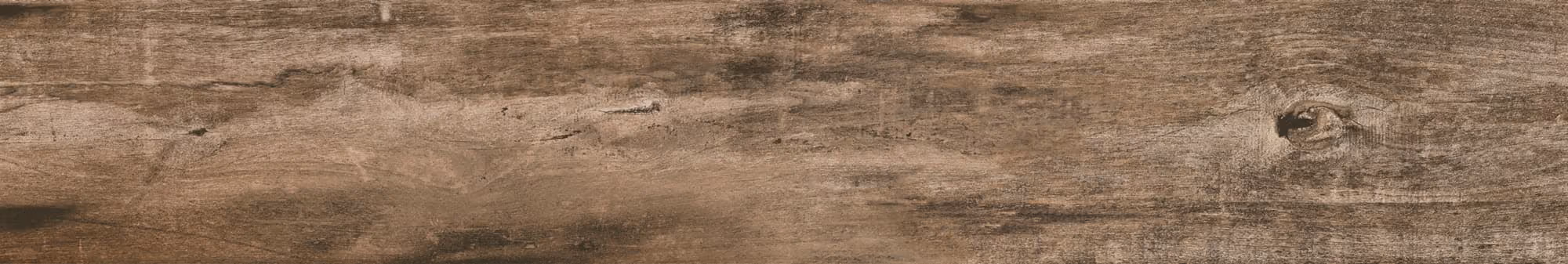 Close-up of brown wooden surface with visible grain and knots.