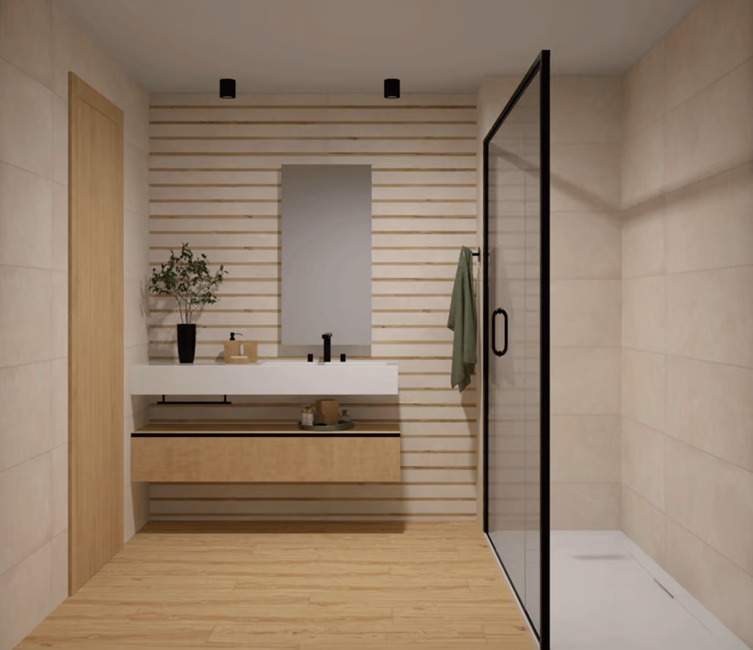 Modern bathroom with wood floor, white floating sink, mirror, glass shower door, and potted plant.
