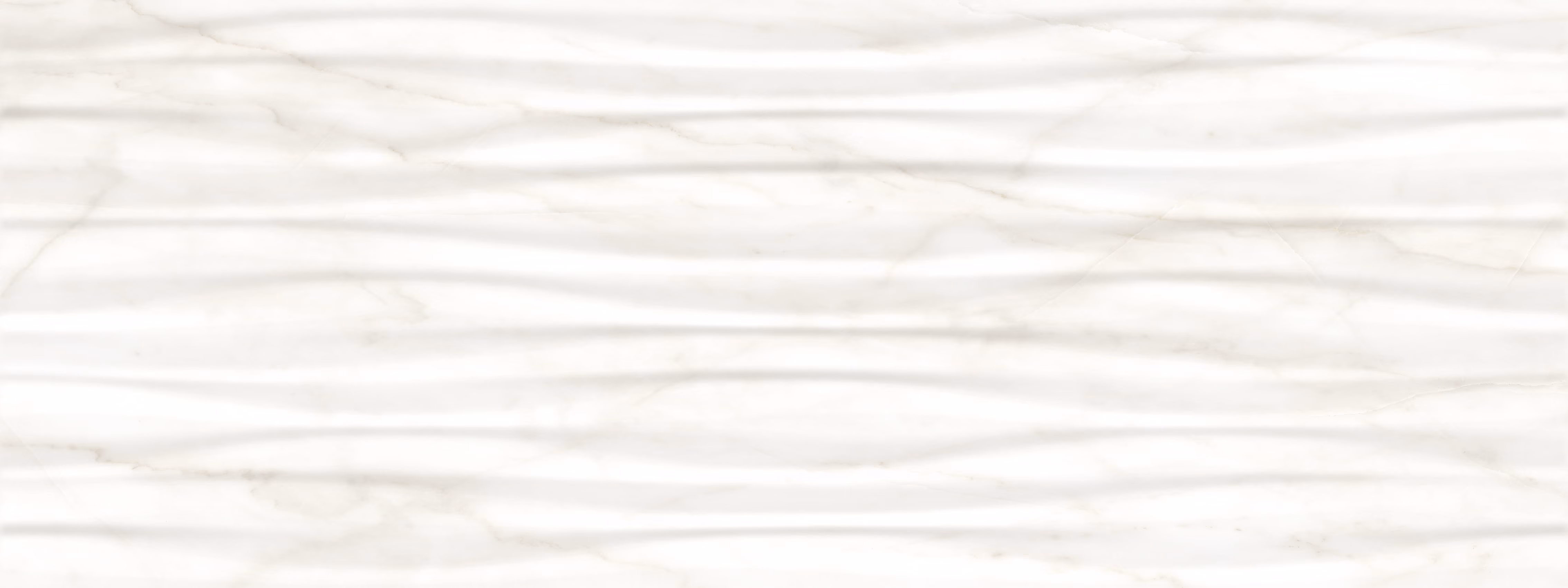 White marble surface with subtle beige veins and a wavy textured pattern.