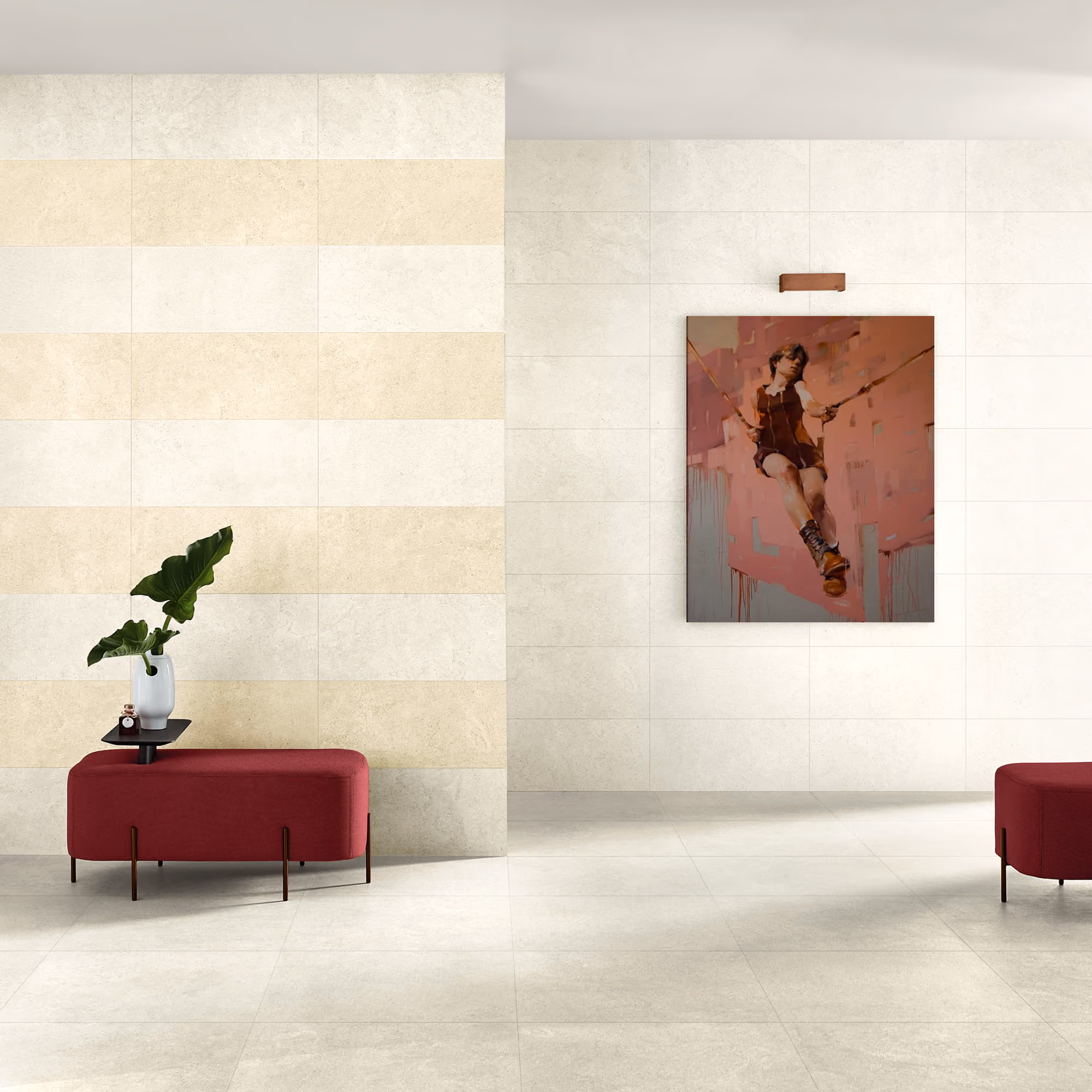 Modern interior with beige tiled walls, burgundy bench, vase with green leaves, and painting of a girl on a swing.