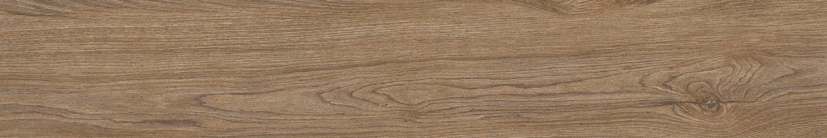 Light brown wooden surface with natural grain patterns and knots.