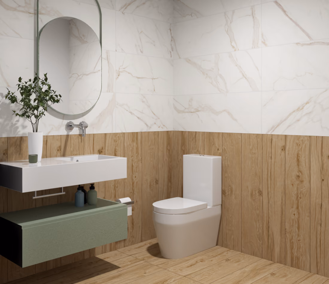 Minimalist bathroom with wall-mounted sink, oval mirror, white toilet, and wood and marble wall tiles.