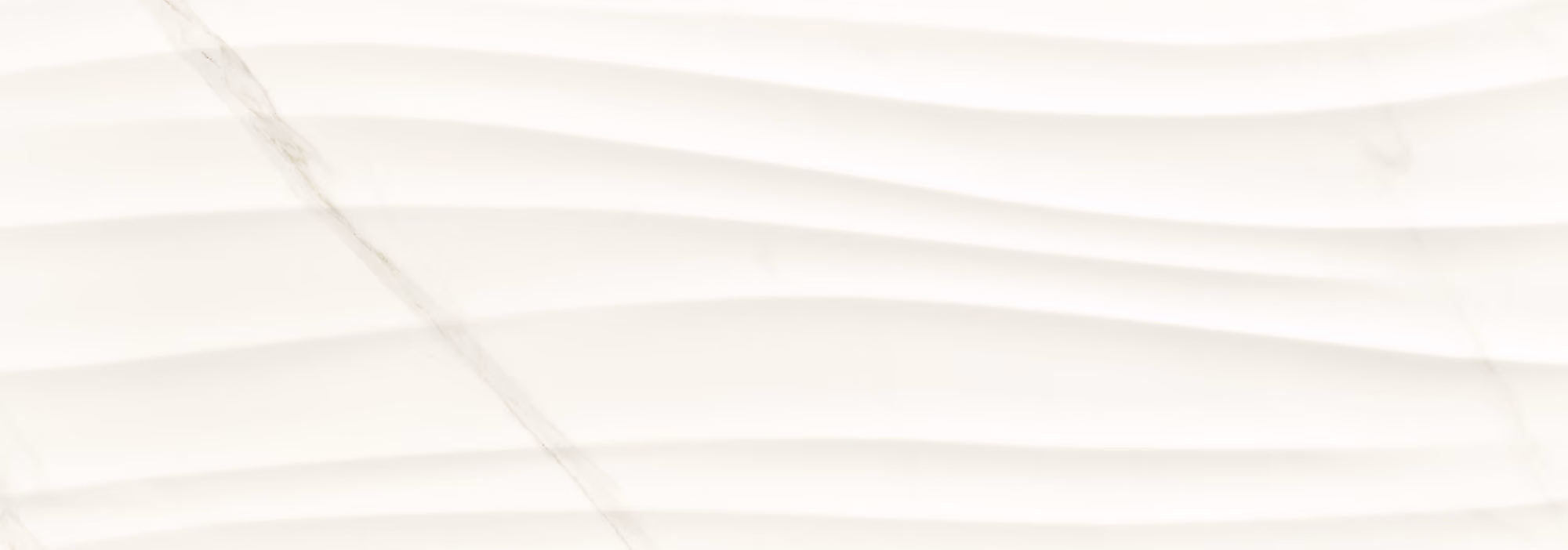 Smooth white marble surface with subtle beige wavy veins and faint grey lines.