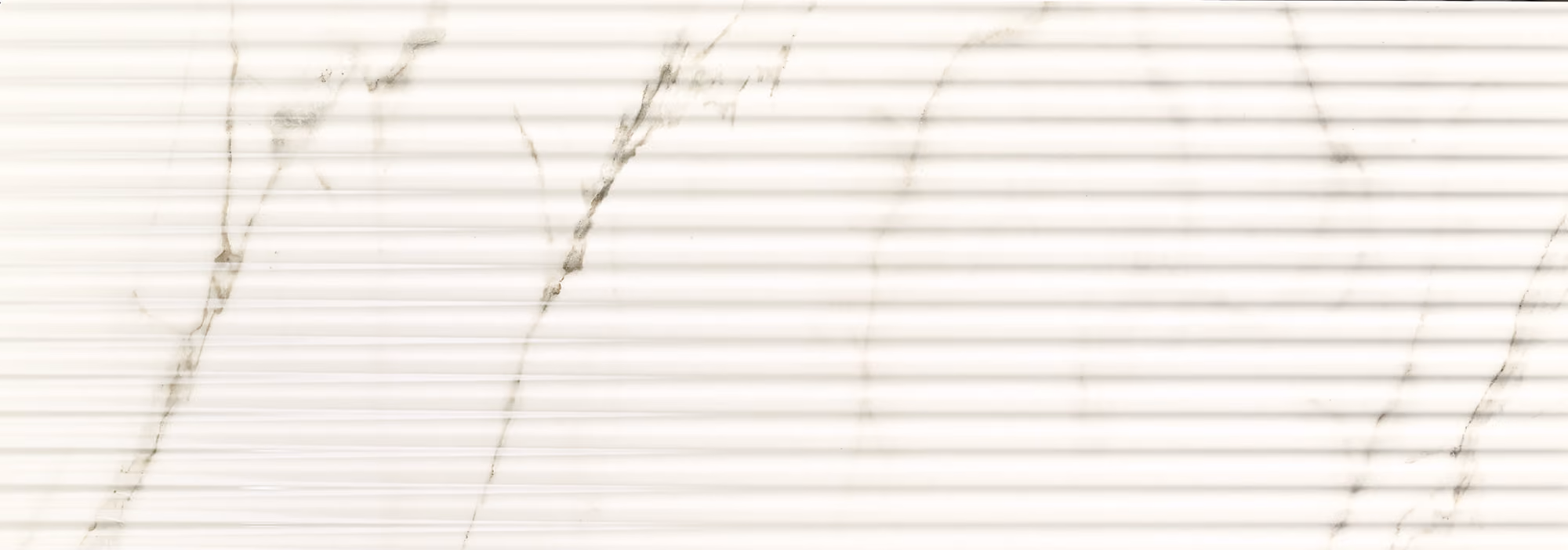 White marble surface with light gray and beige veining texture pattern.