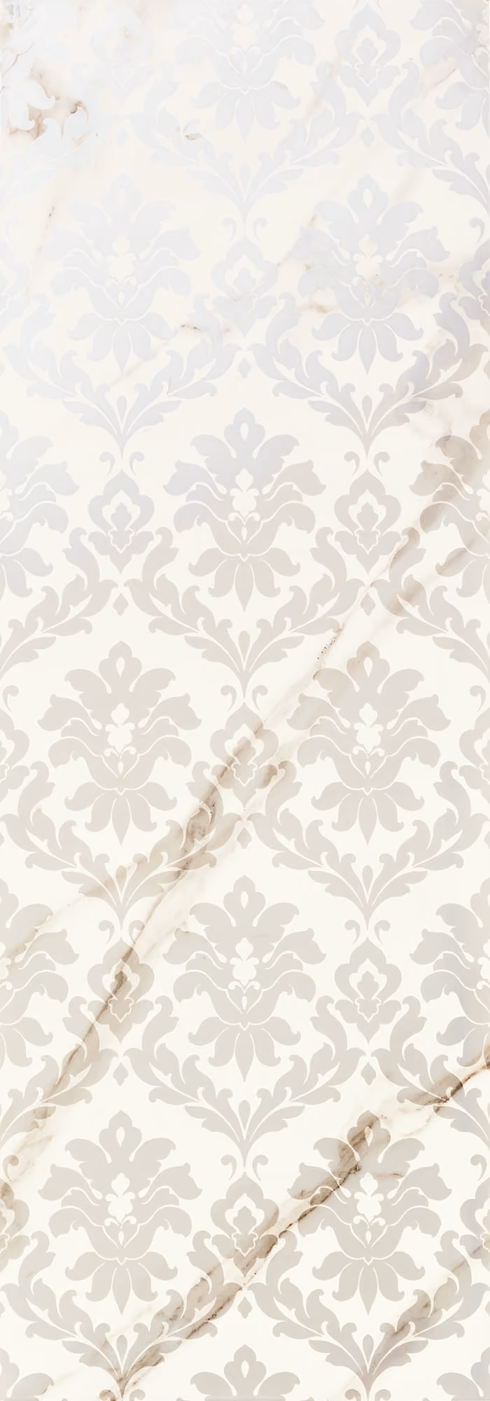 White marble surface with light gray damask pattern and subtle beige veining.