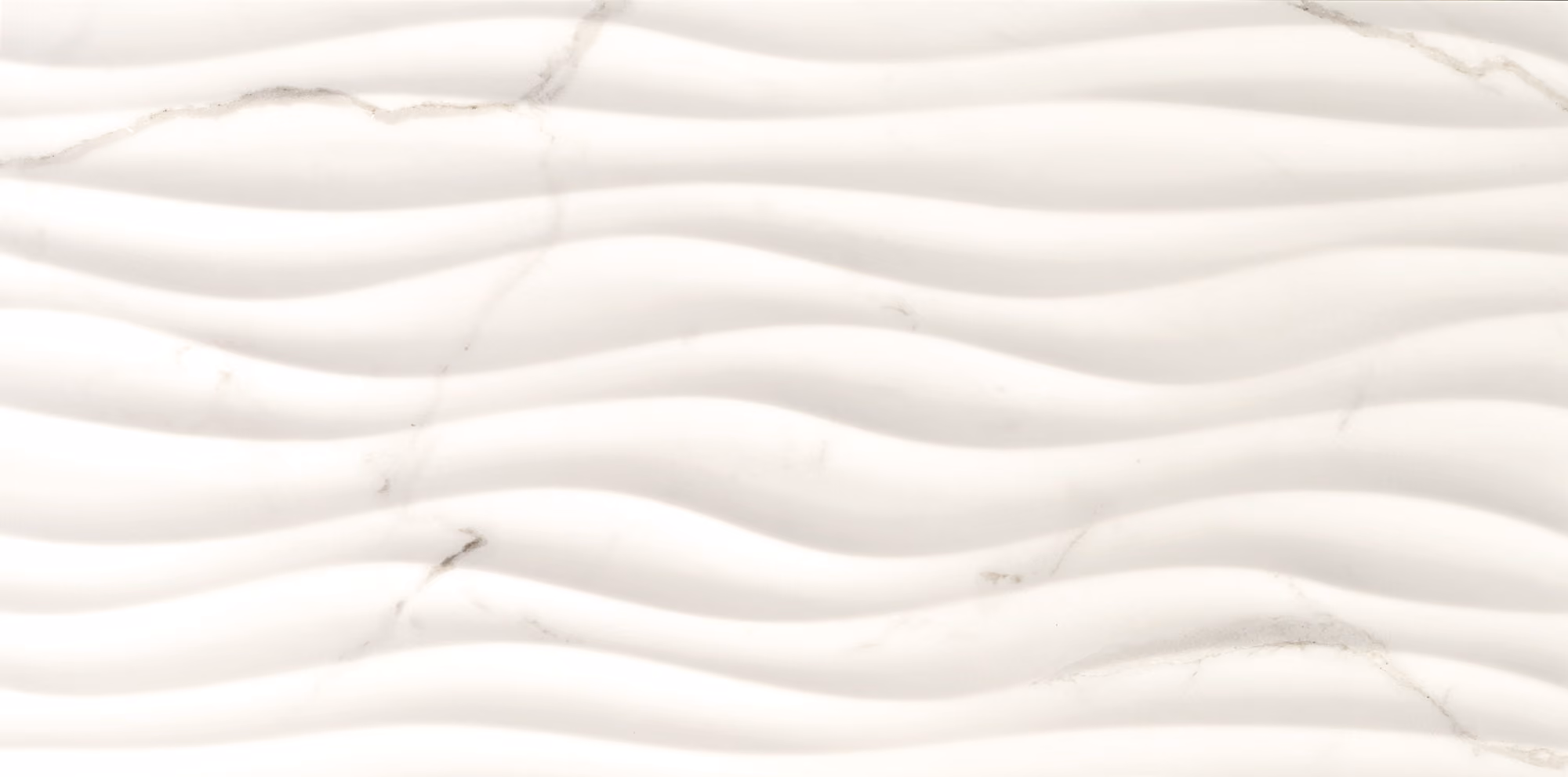 White marble surface with soft wavy texture and subtle gray veining details.