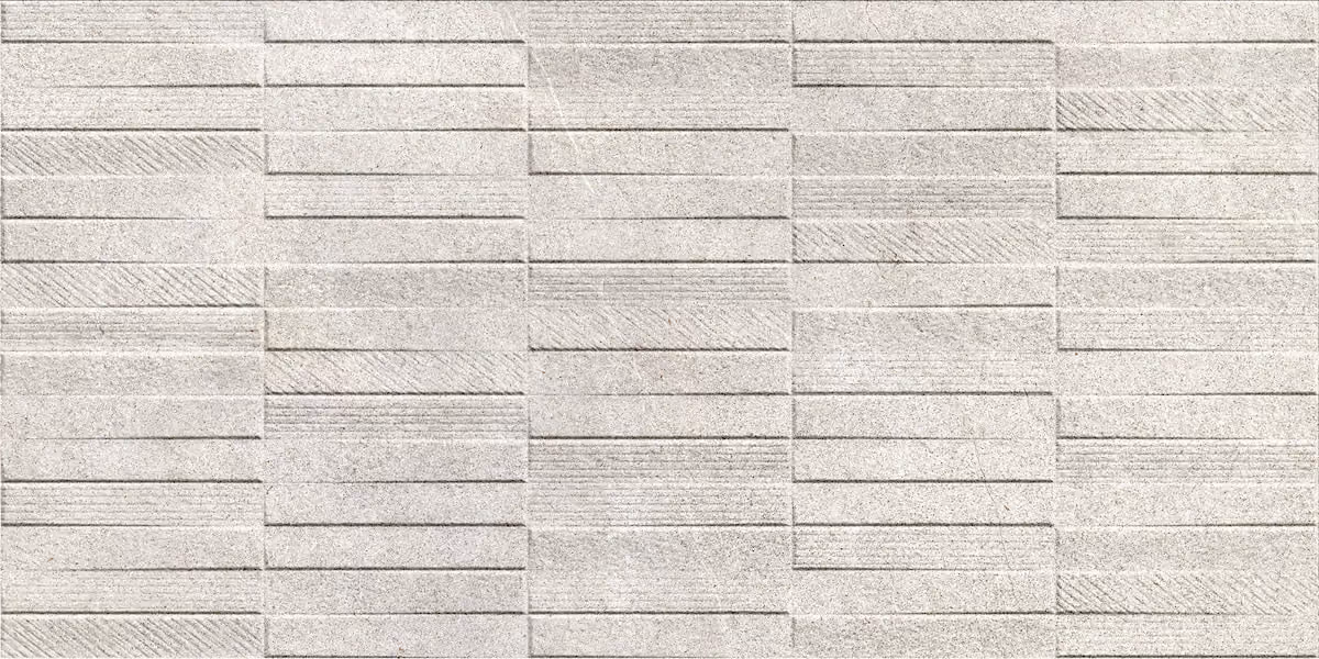 Light grey textured wall tiles arranged in a staggered brick pattern with horizontal grooves.