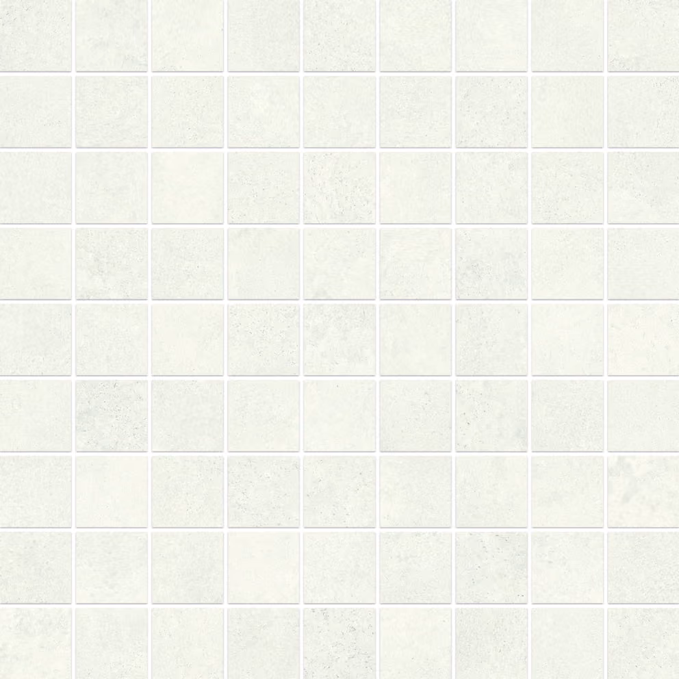 Close-up of a white tile wall with a subtle speckled texture and grout lines.