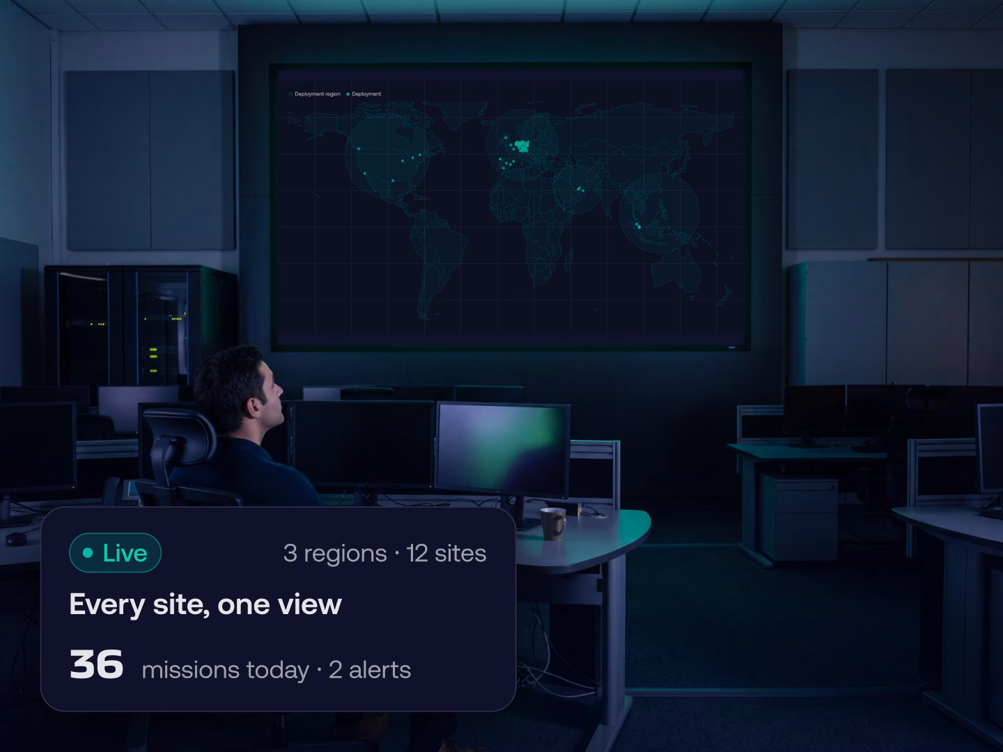Operator in a utility control room viewing the Korial deployment map on a wall screen