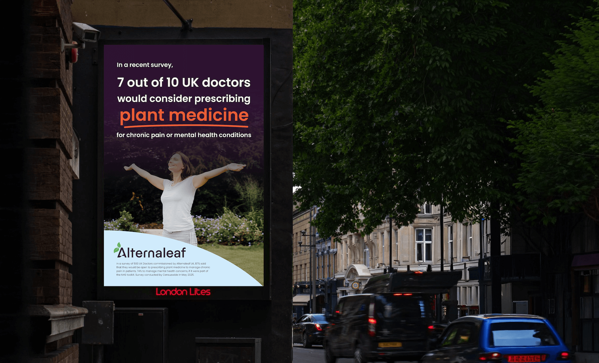 A photo of a digital poster on the street near kings cross station displaying a full advert for Alternaleaf