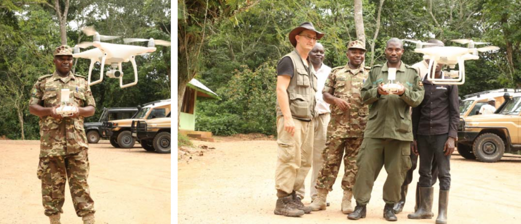 Kibale National Park Warden Baleysiima Godfrey and ranger African Kob each take a turn in operating the anti-poaching drone provided by the Rare Species Fund.