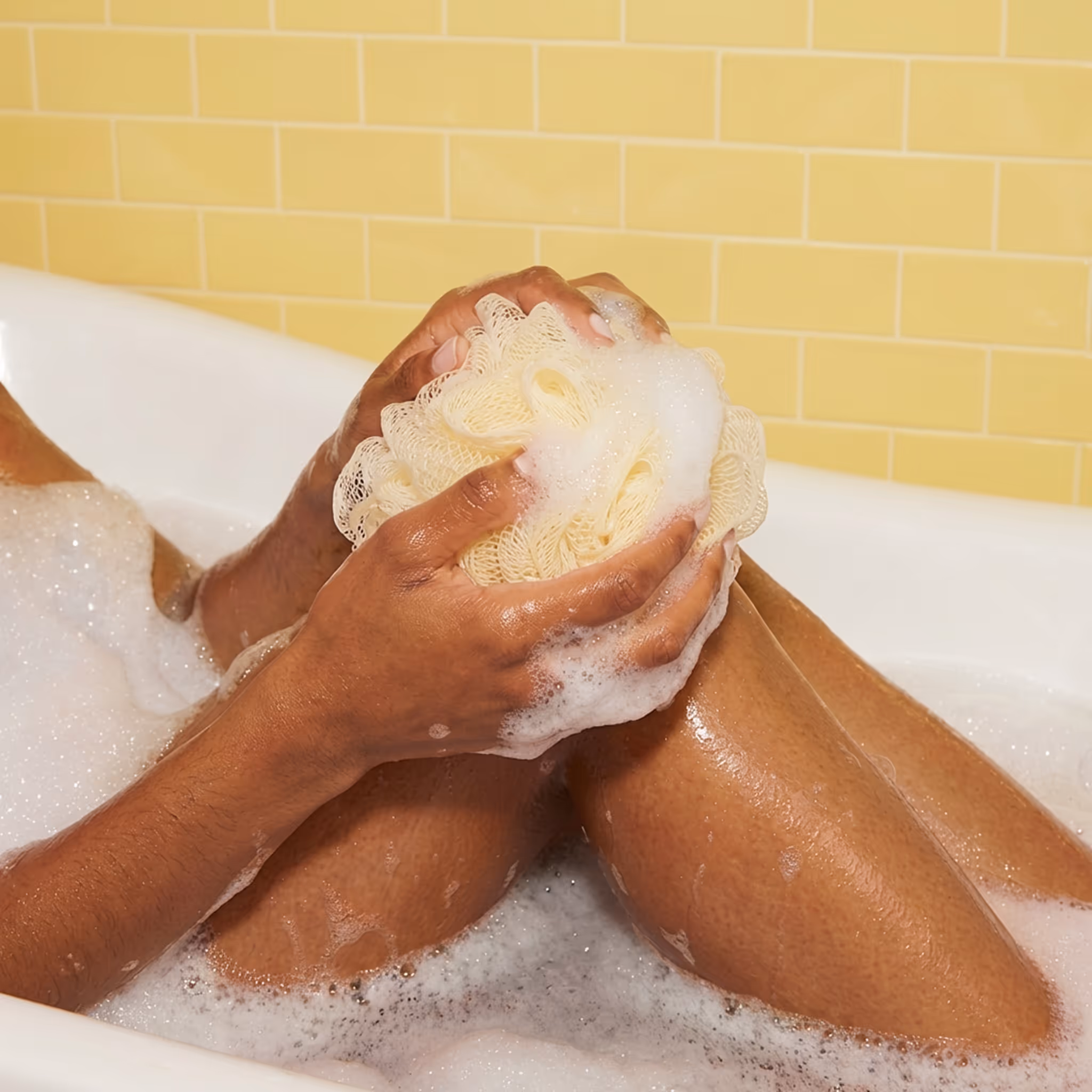 Compostable mesh sponge used in bath for gentle body cleansing