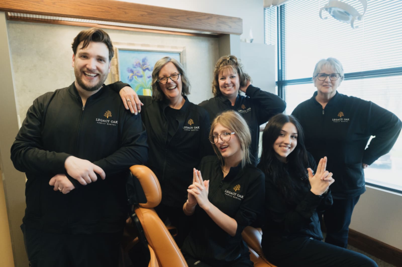 Legacy Oak Family Dental team members posing together in office