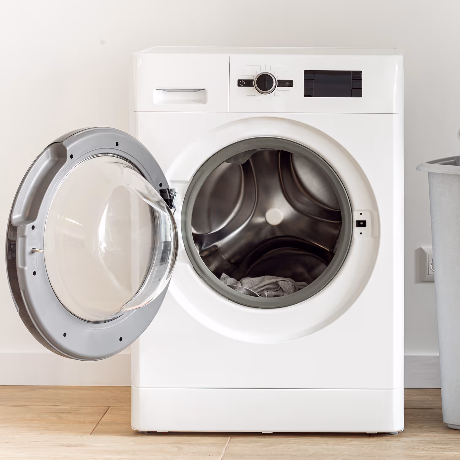 Open front-load washing machine drum, representing D&D's washer and dryer repair service