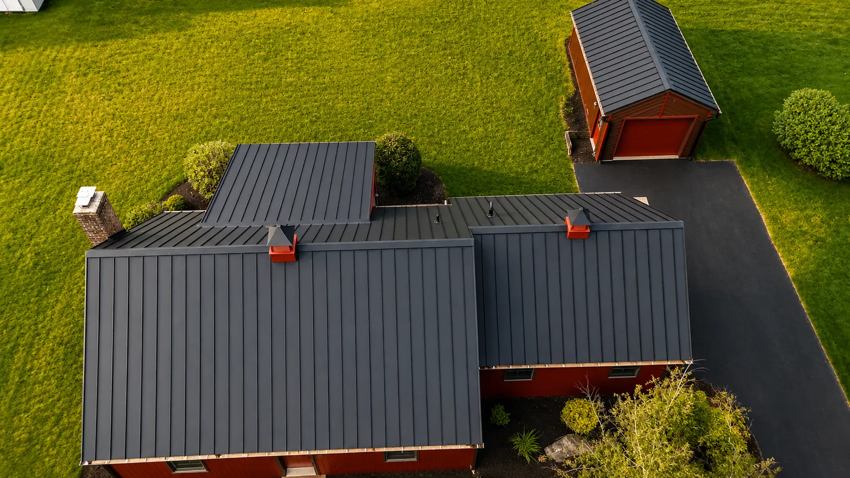 New Black Standing Seam Metal Roof for on a Red Home in Lancaster, PA