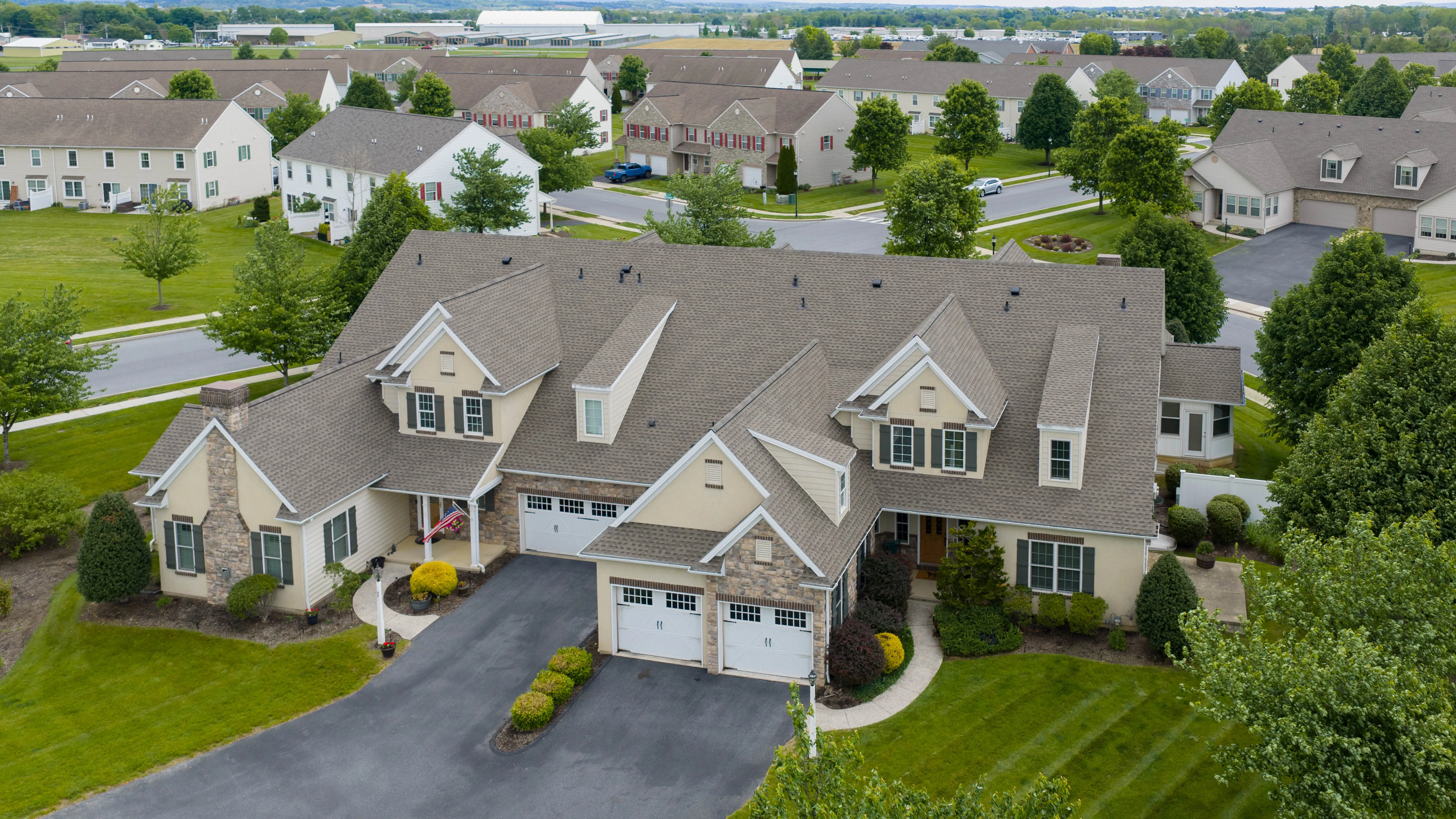 large home with new shingle roofing in Palymra, PA, installed by crew at Scenic View Roofing