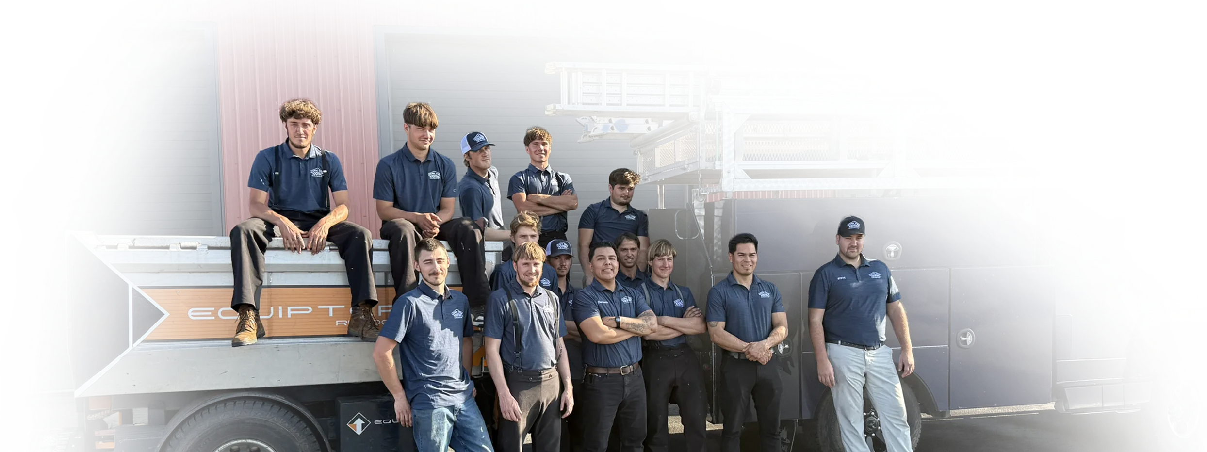 The Scenic View Roofing team posing for a picture in front of their work truck.