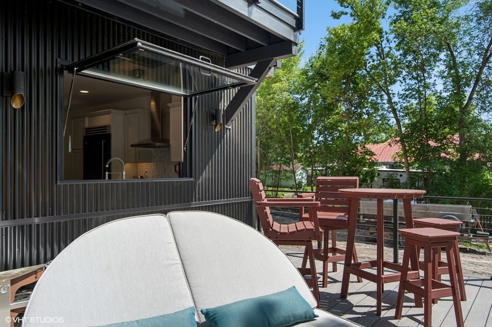 pass through window to outdoor dining area at a SmartPads home