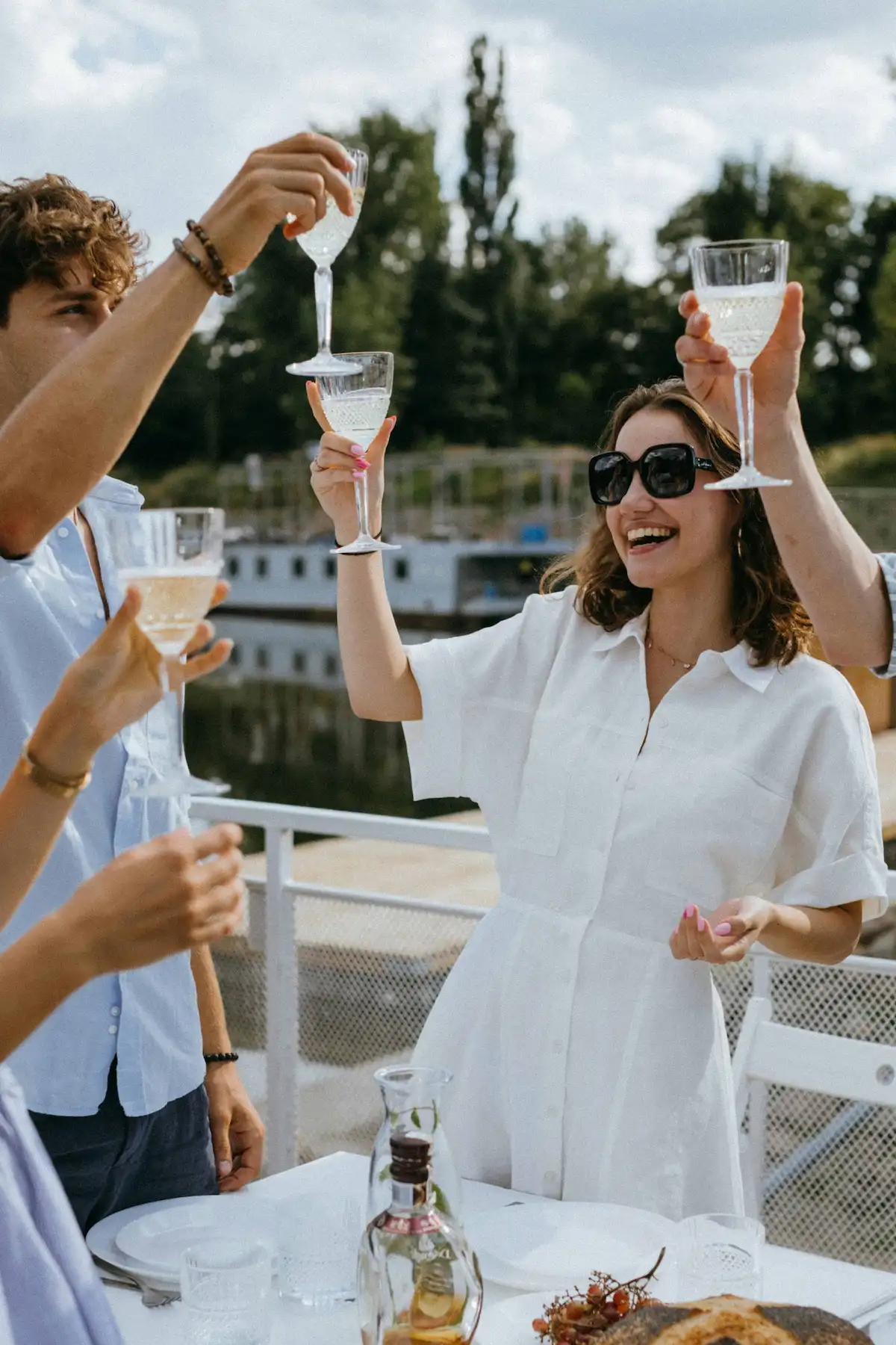young group of travellers toasting in european city