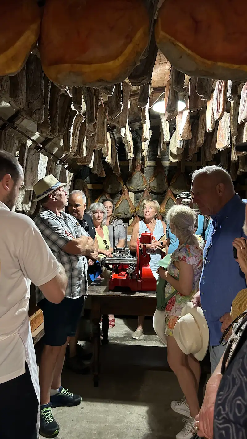 travellers of epicureans in wine cellar