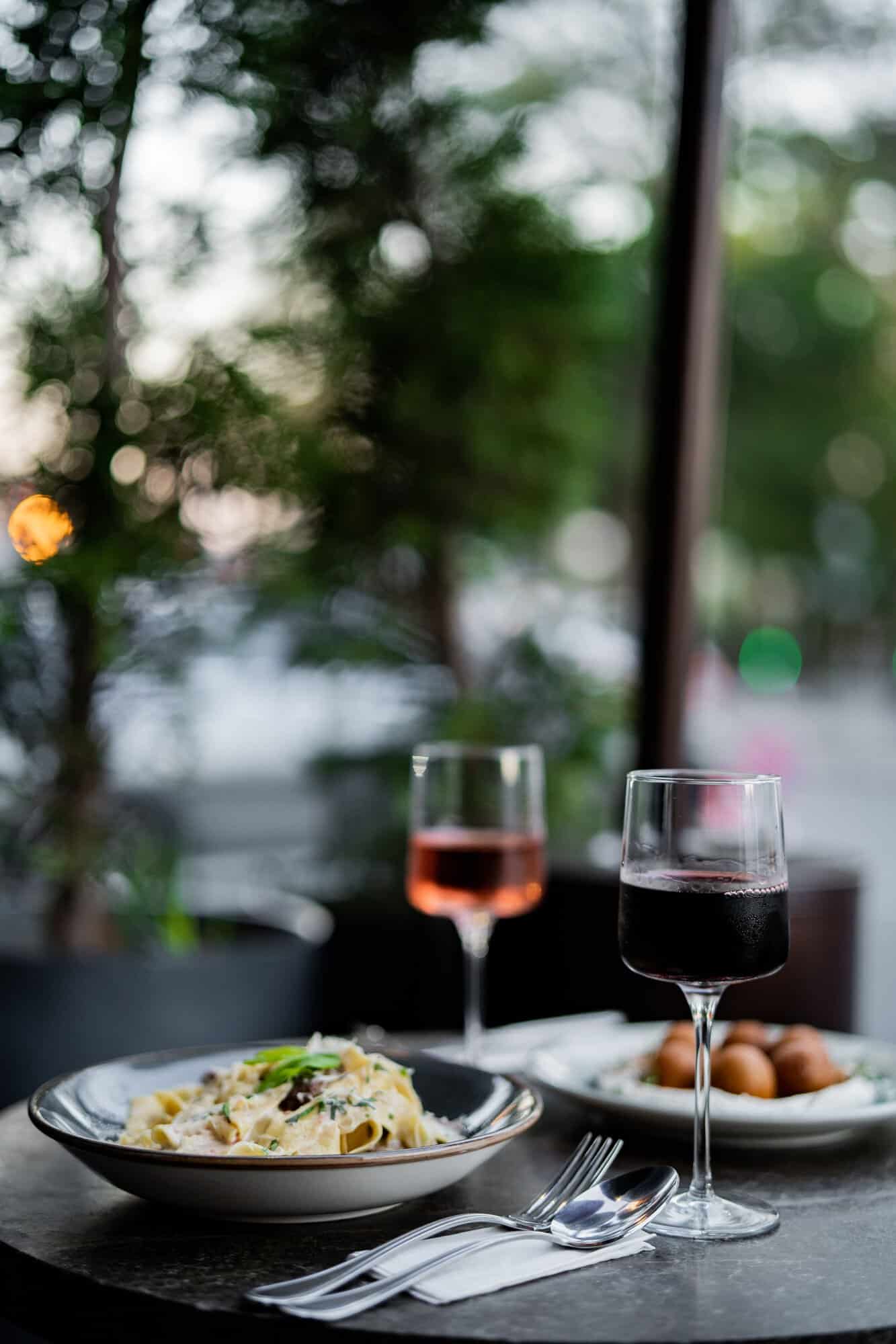wine and dinner set on outdor table