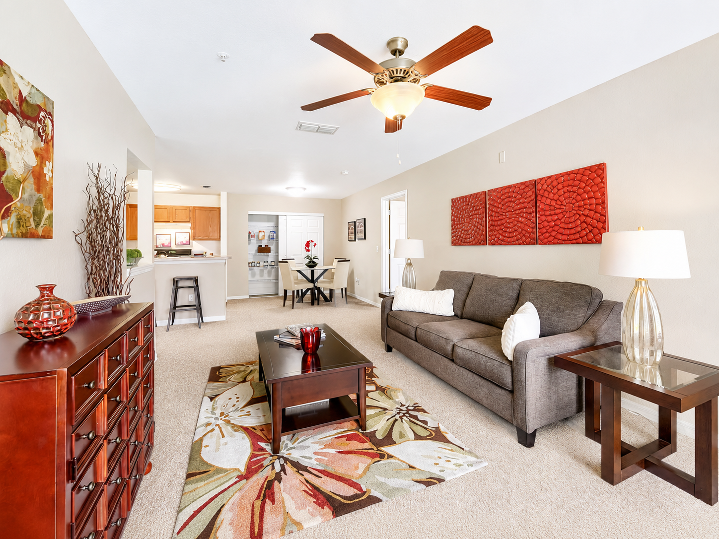Living area with sofa, coffee table and lamp