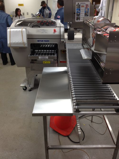 image of an employee assisting a customer in a department store