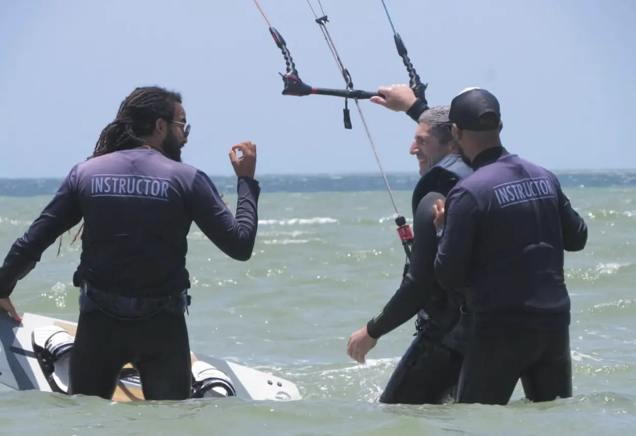 Instructor teaching a beginner kite control on the shallow Dakhla lagoon