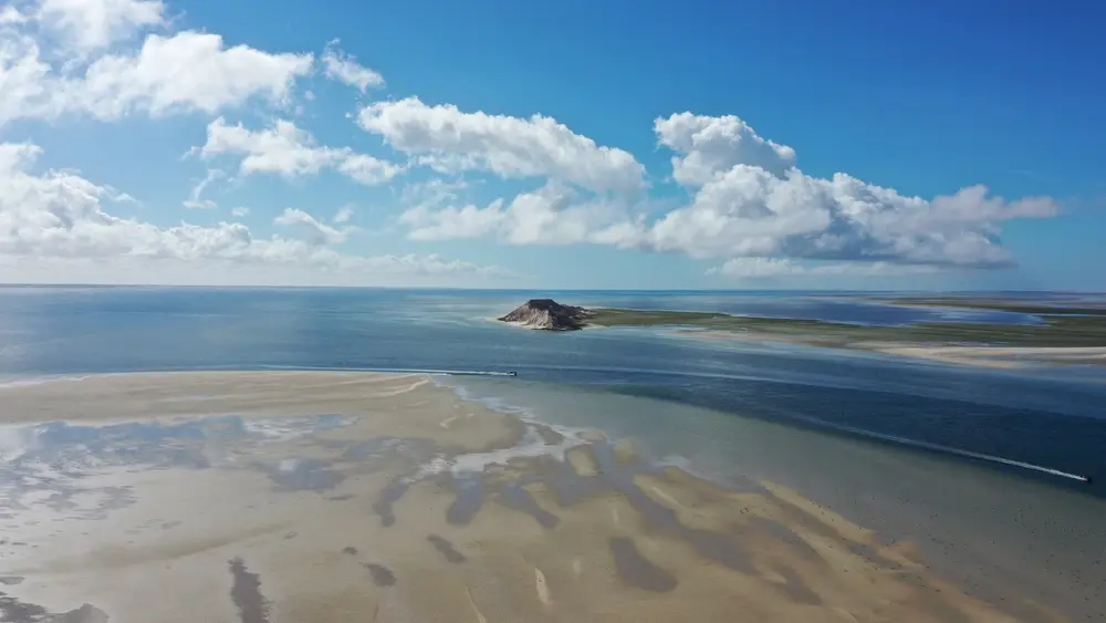 Aerial drone view of the Dakhla lagoon in Morocco showing sandbars, shallow channels and calm water