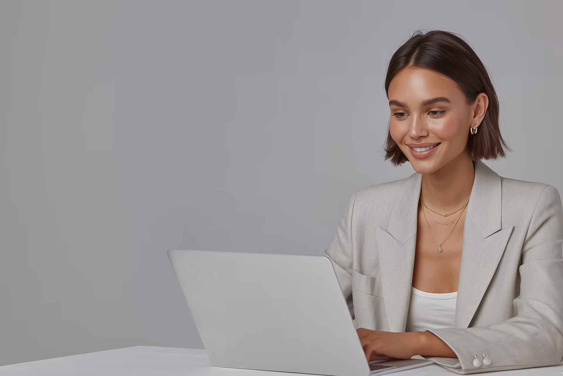 Business professional working at a laptop