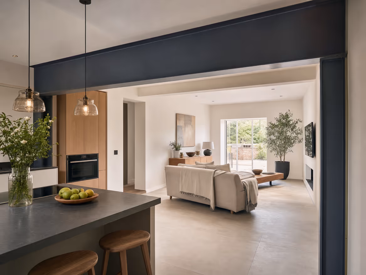Open-plan kitchen living room with exposed structural steel beam