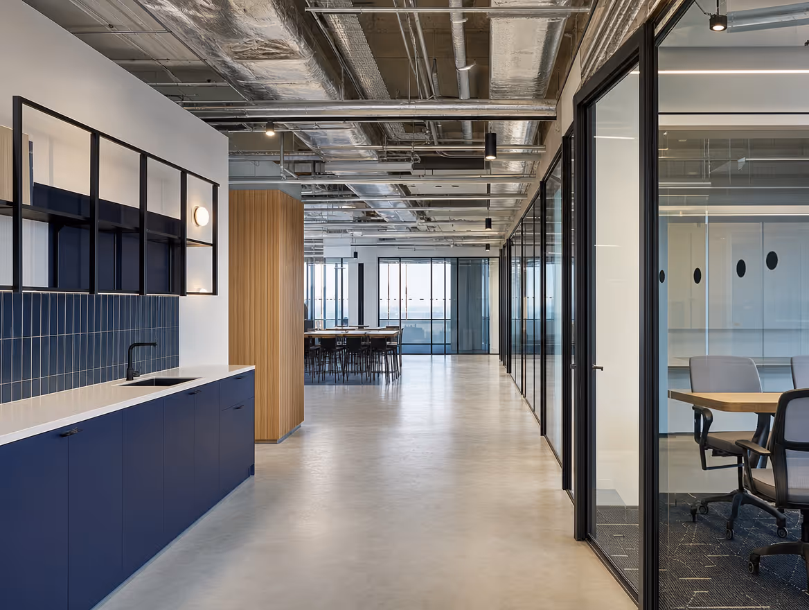 Refurbished commercial office with glazed partitions and modern fit-out