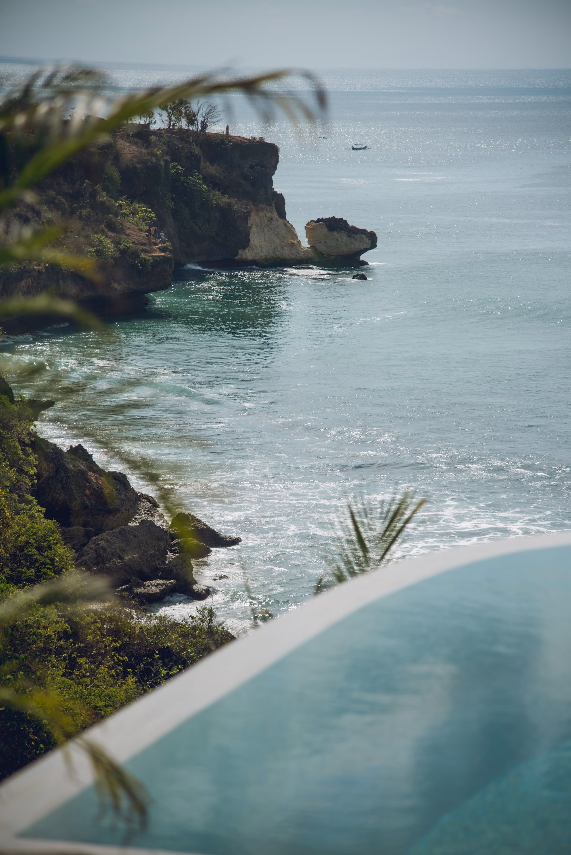 Pool overlooking an ocean.