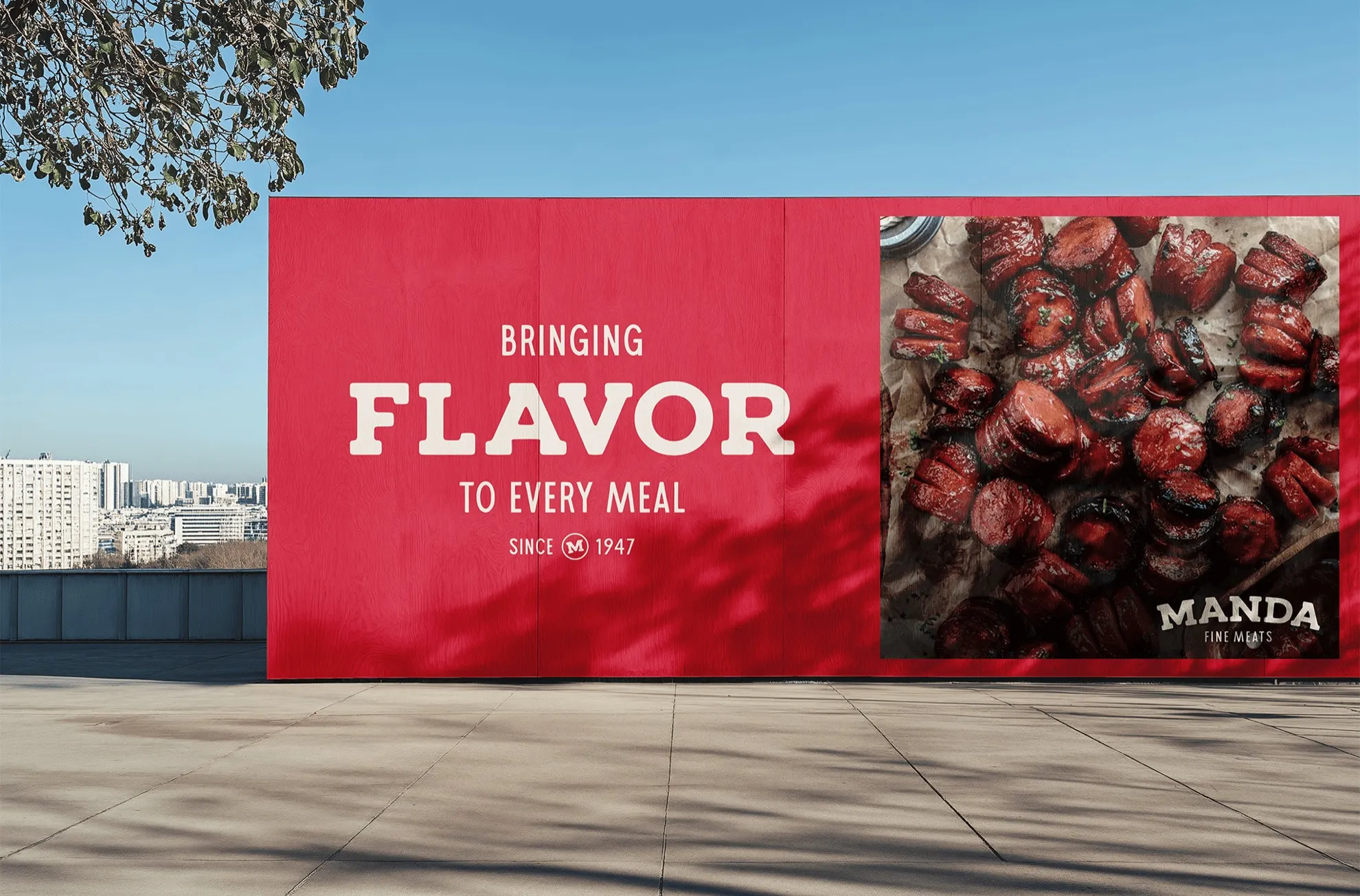 A Manda billboard reading Bringing Flavor to Every Meal beside a photo of sausages
