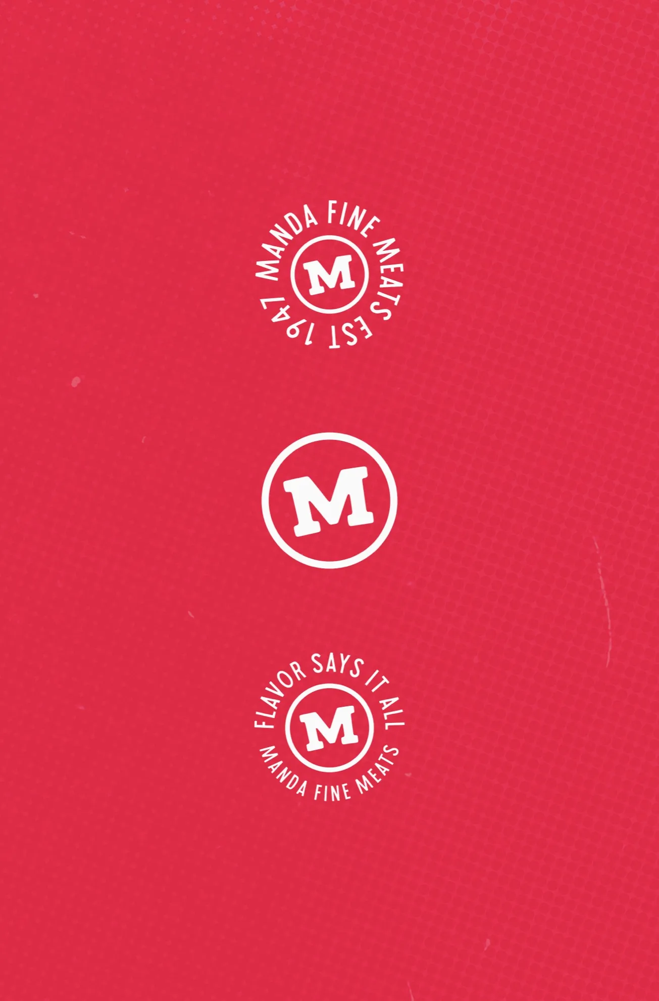 Three Manda Fine Meats badge logos in white on a red background